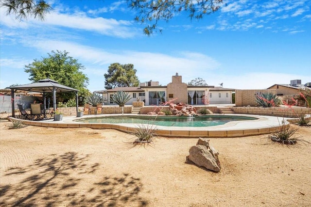 view of pool featuring a gazebo and a patio