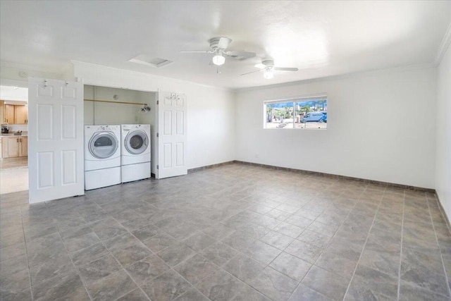 laundry room featuring ceiling fan, ornamental molding, and washer and dryer