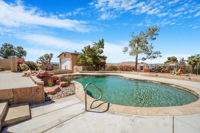 view of pool with a patio