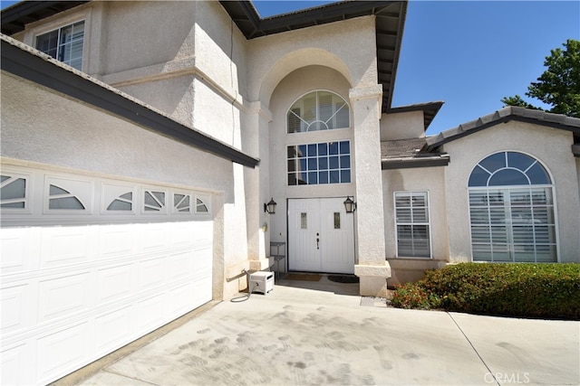 property entrance featuring a garage