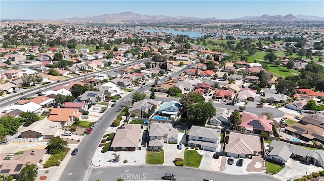 drone / aerial view featuring a mountain view