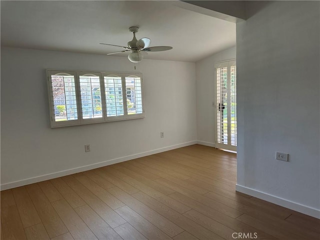 unfurnished room featuring wood-type flooring and ceiling fan