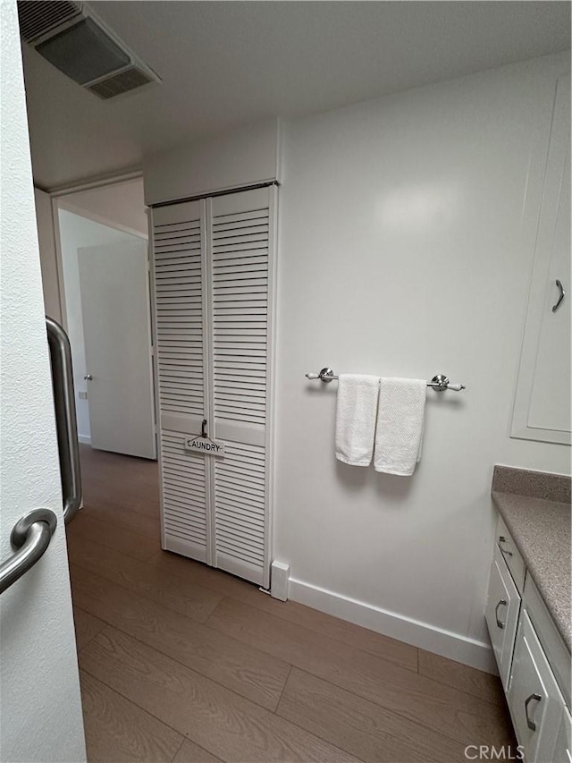 bathroom featuring hardwood / wood-style floors