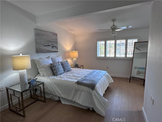 bedroom with hardwood / wood-style flooring and ceiling fan