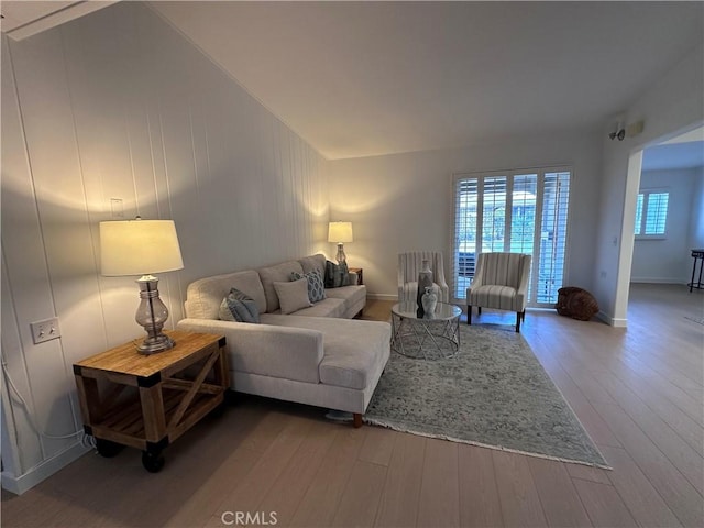 living room with a healthy amount of sunlight and wood-type flooring