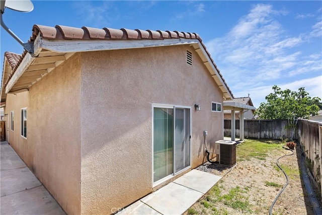 view of property exterior featuring central AC unit