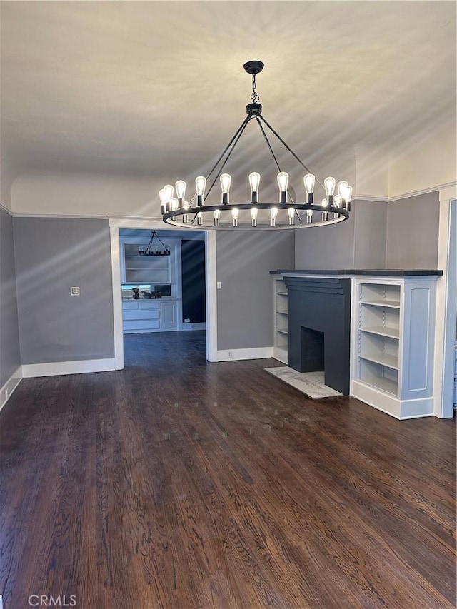 unfurnished dining area featuring dark wood-type flooring