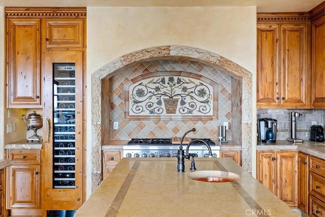 kitchen featuring decorative backsplash and sink