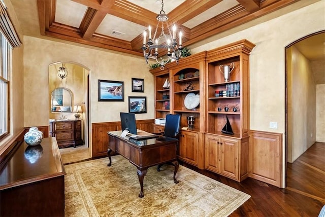 office featuring beam ceiling, hardwood / wood-style floors, a chandelier, and coffered ceiling