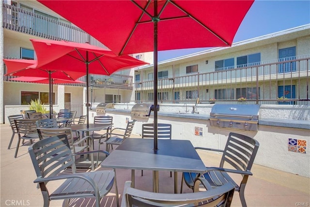 view of patio with sink and grilling area