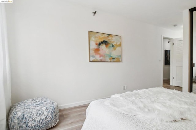 bedroom featuring light hardwood / wood-style floors