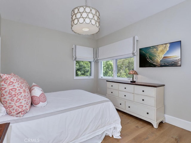 bedroom featuring hardwood / wood-style flooring