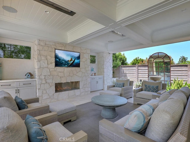 view of patio / terrace with an outdoor living space with a fireplace