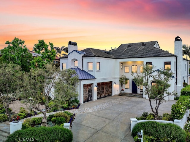 view of front of property featuring a garage