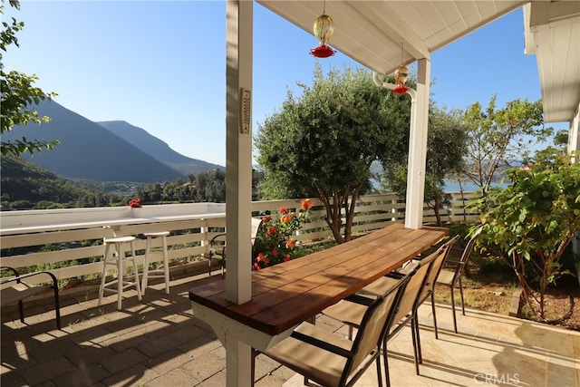 view of patio / terrace with a mountain view