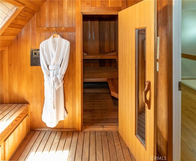 view of sauna / steam room with hardwood / wood-style floors and a skylight