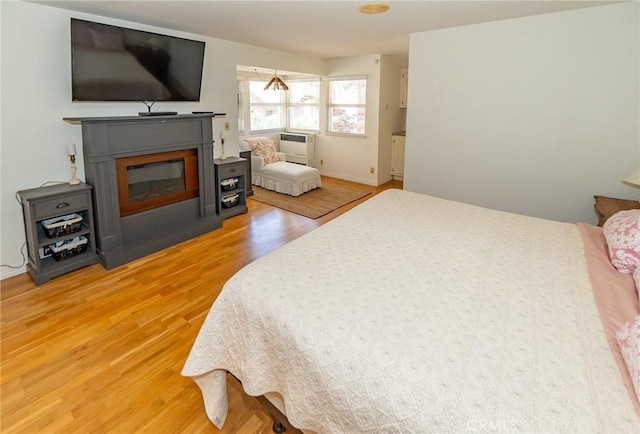 bedroom featuring wood-type flooring