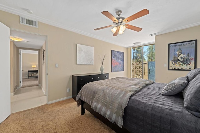 bedroom with ceiling fan and light colored carpet