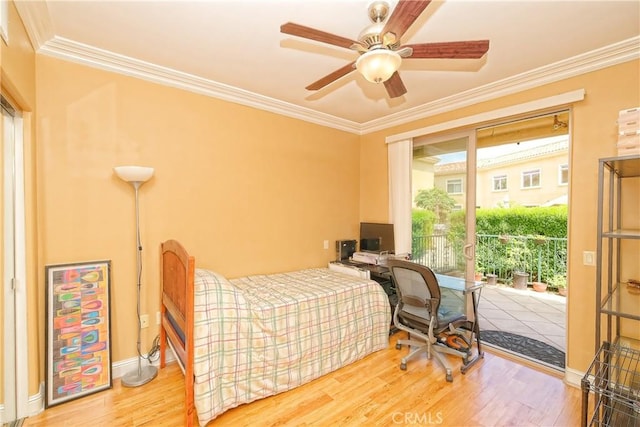 bedroom featuring ceiling fan, light hardwood / wood-style flooring, and crown molding