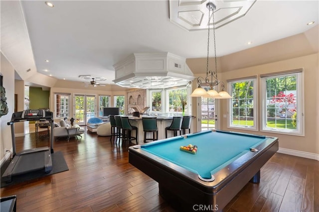 game room featuring plenty of natural light, dark wood-type flooring, and pool table