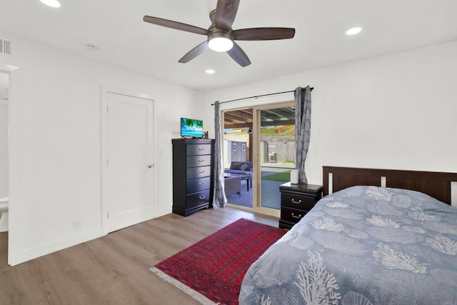 bedroom with ceiling fan, light hardwood / wood-style flooring, and access to outside