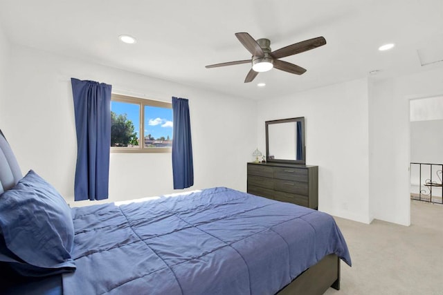 carpeted bedroom with ceiling fan