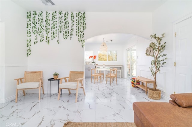 sitting room with light tile patterned floors