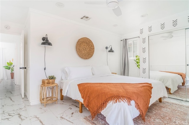 tiled bedroom featuring crown molding and ceiling fan