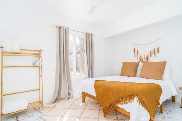 tiled bedroom featuring multiple windows and ceiling fan