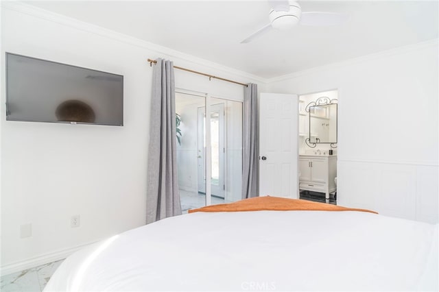 tiled bedroom with a closet, ornamental molding, and ceiling fan