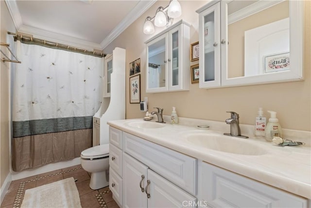 full bathroom featuring ornamental molding, tile patterned flooring, a sink, and toilet