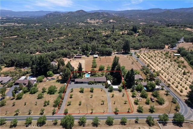 aerial view with a rural view and a mountain view