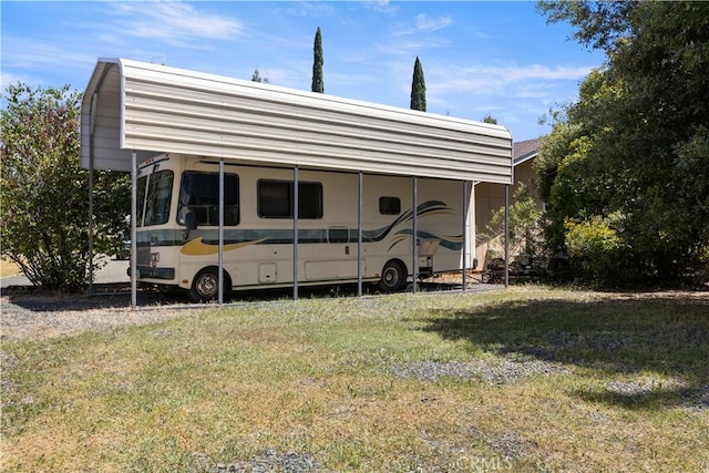 view of outbuilding with a carport