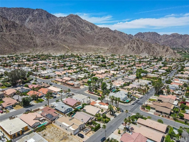 bird's eye view with a mountain view