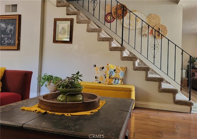 dining area with hardwood / wood-style floors