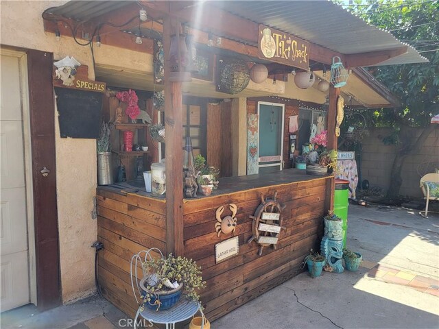 view of patio / terrace with an outdoor bar