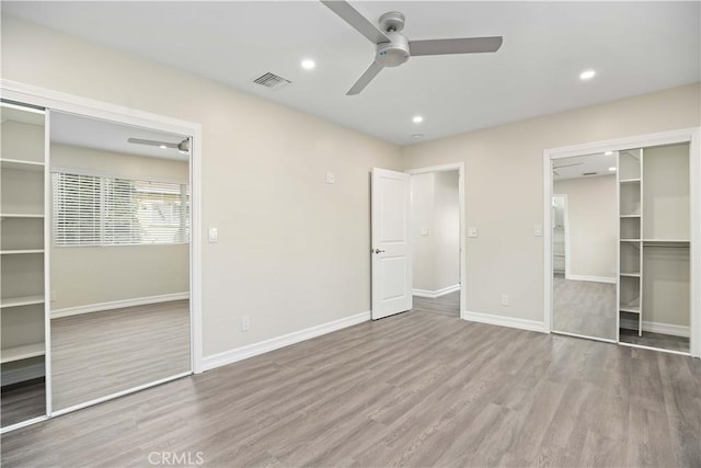 unfurnished bedroom featuring a closet, ceiling fan, and light hardwood / wood-style flooring