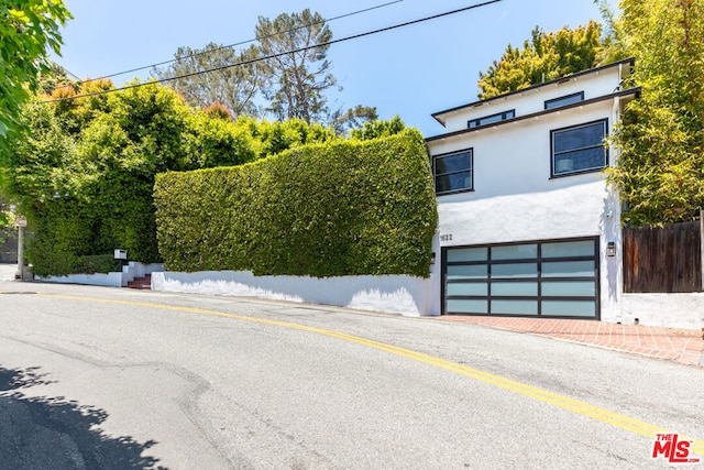 modern home featuring a garage