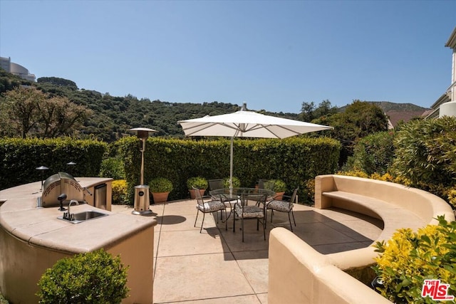 view of patio / terrace with sink