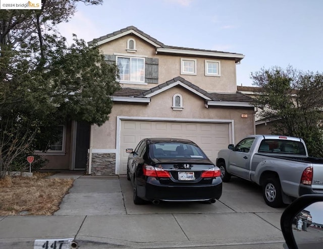 front facade with a garage