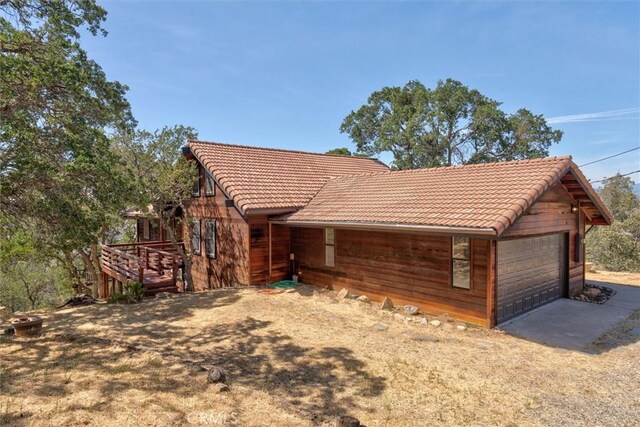 view of front of house with a wooden deck