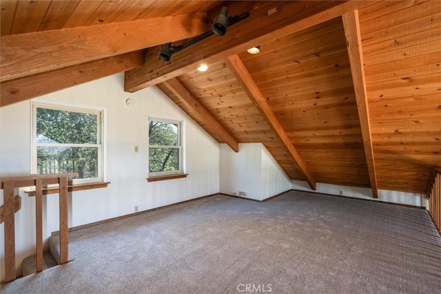 additional living space featuring lofted ceiling with beams, carpet flooring, wood ceiling, and baseboards