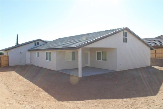 rear view of property with a patio area