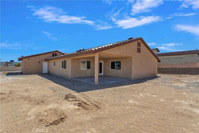 rear view of property with a patio