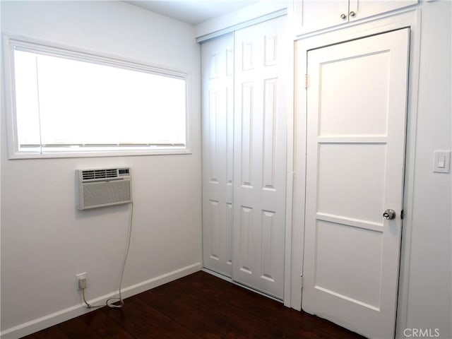 closet featuring a wall unit AC