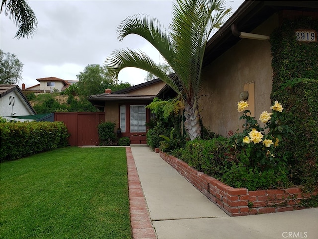 exterior space with a lawn