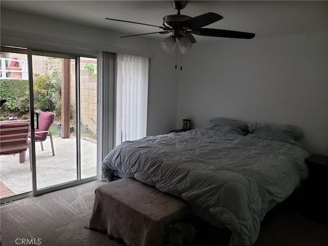 bedroom featuring access to outside, ceiling fan, and carpet floors