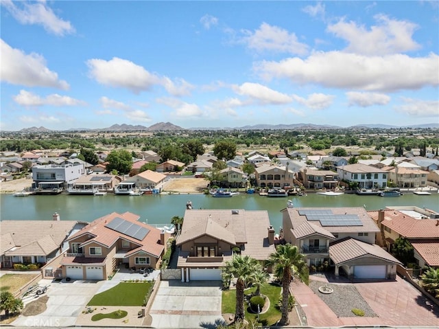 aerial view featuring a residential view and a water view