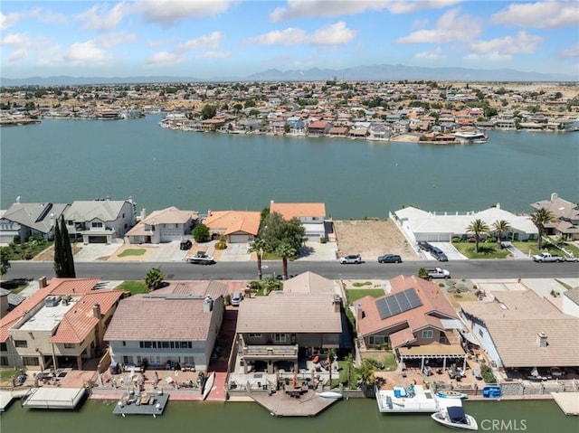 aerial view featuring a residential view and a water view