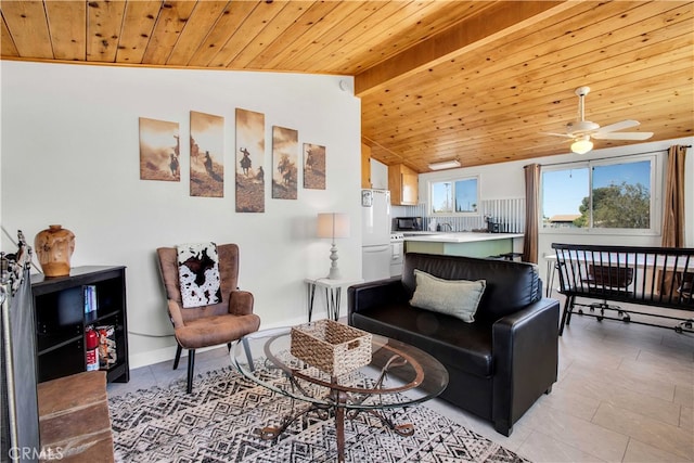 living room featuring ceiling fan, vaulted ceiling, light tile patterned floors, and wood ceiling